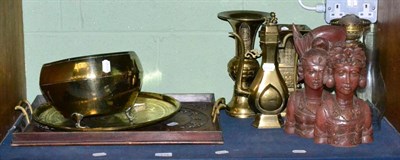 Lot 234 - A pair of Middle Eastern brass candlesticks and Eastern brass ware, a carved tray, etc