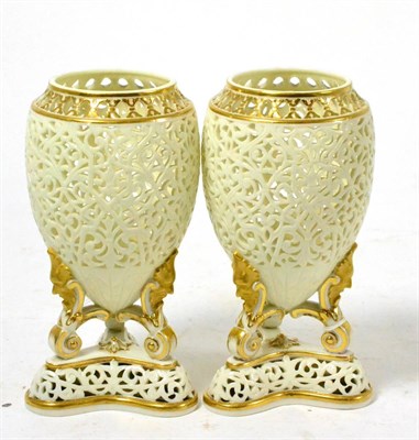 Lot 242 - A pair of Grainger & Co reticulated Worcester vases