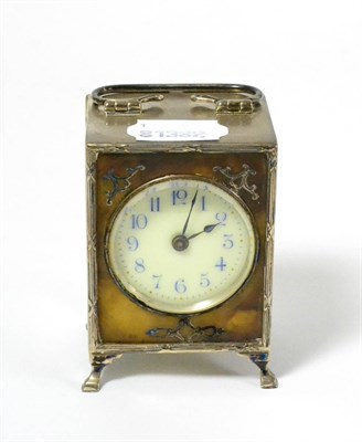 Lot 248 - An early 20th century silver and tortoiseshell small mantel clock