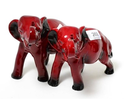 Lot 269 - Royal Doulton flambe pair of elephants