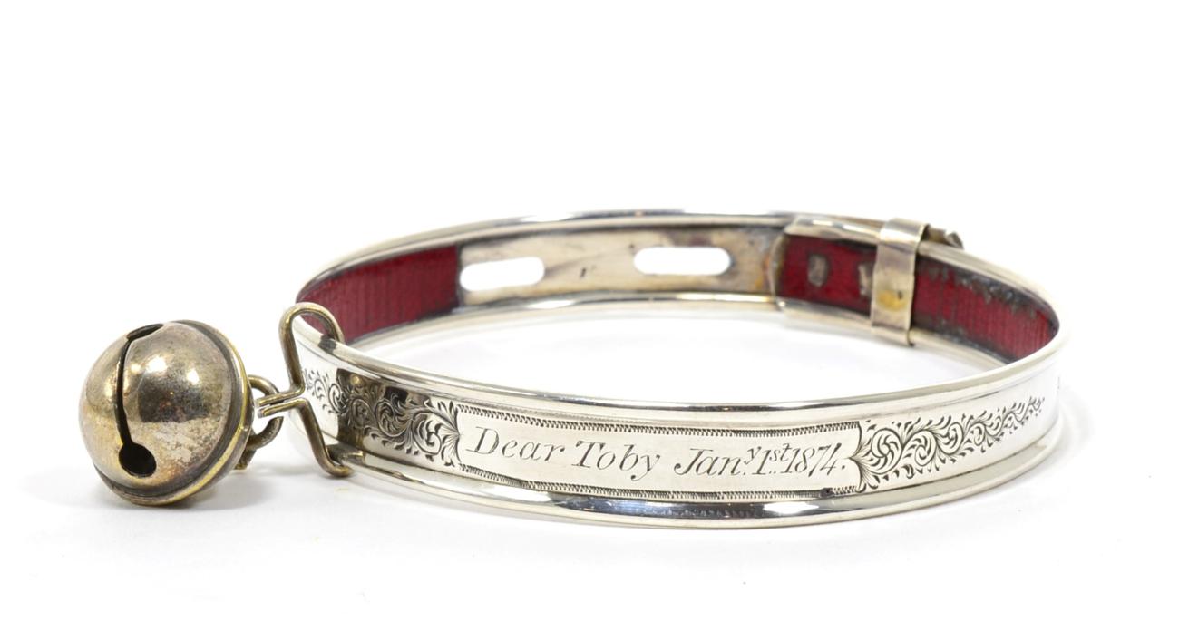 Lot 28 - A Victorian White Metal Dog Collar, inscribed Dear Toby Jan.y 1st 1874 within foliate scrolls, with