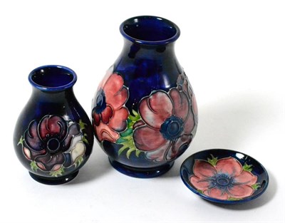 Lot 296 - Two Walter Moorcroft anemone pattern small vases and a similar pin dish