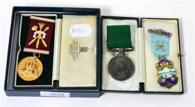 Lot 305 - A gold Masonic medal, a silver gilt Masonic medal and a long service medal