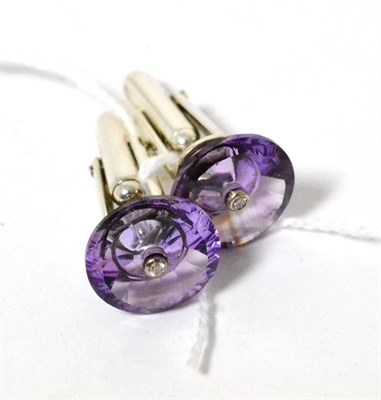 Lot 314 - A pair of amethyst and diamond Lehrer Torusring cufflinks