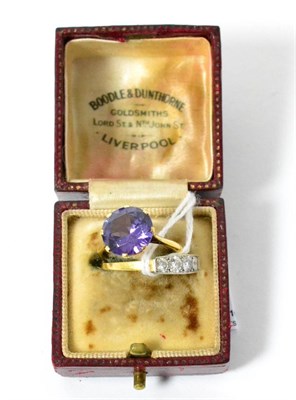 Lot 330 - A four stone diamond ring and a dress ring