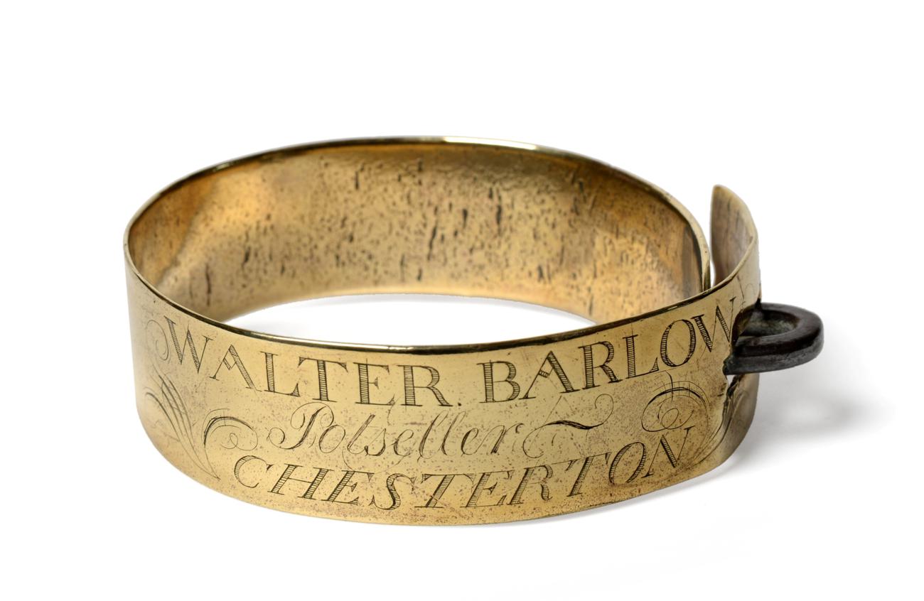 Lot 35 - A Brass Dog Collar, early 19th century, inscribed WALTER BARLOW / Potseller / CHESTERTON, 10cm...