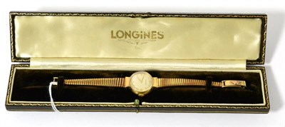 Lot 377 - A lady's 9ct gold Longines wristwatch, original box