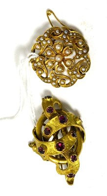 Lot 387 - A seed pearl brooch and a Victorian garnet set brooch