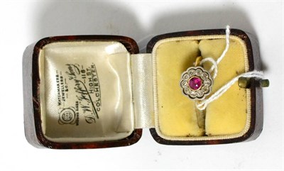 Lot 391 - A ruby and diamond cluster ring