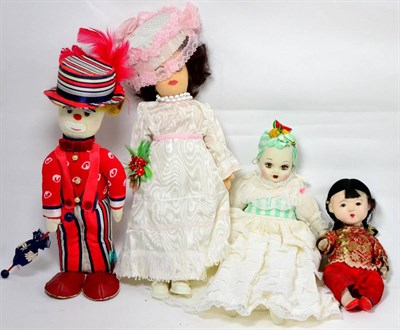 Lot 400 - Pressed felt doll modelled as a bride, modern fabric clown, modern bisque doll and papier mache...