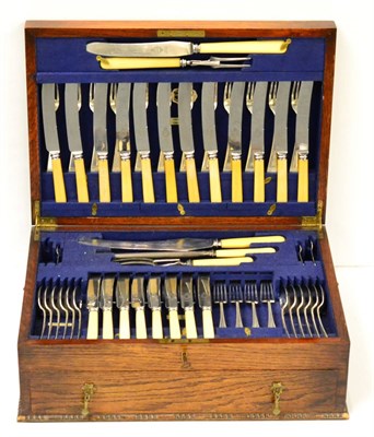 Lot 414 - Plated canteen of cutlery in an oak box