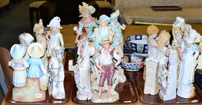 Lot 426 - A large collection of bisque figurines including various pairs (18)