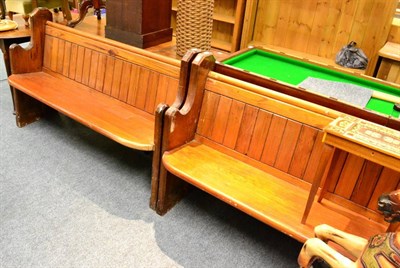 Lot 1046 - A pair of pine church pews