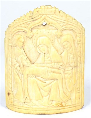 Lot 51 - A French Ivory Plaque, in 14th century style, carved in low relief with the Pieta flanked by...