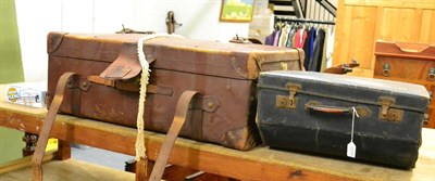 Lot 1079 - A piano accordion, cased, a roll up piano keyboard and a stitched leather trunk