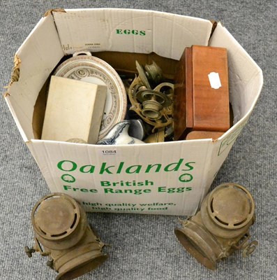 Lot 1084 - A box of miscellaneous including a pair of coaching lamps, various glass, ceramics etc (qty)