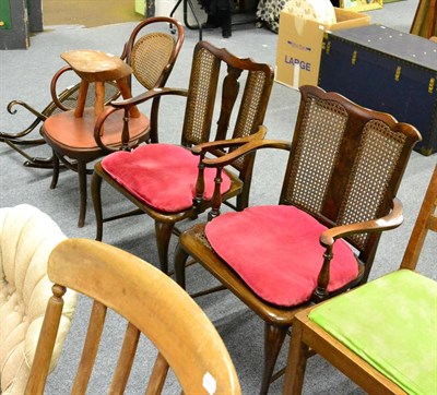 Lot 1093 - Three bergere chairs, a bergere stool and a cow stool