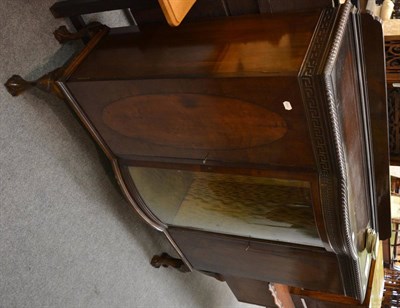 Lot 1133 - An early 20th century mahogany bow fronted display cupboard