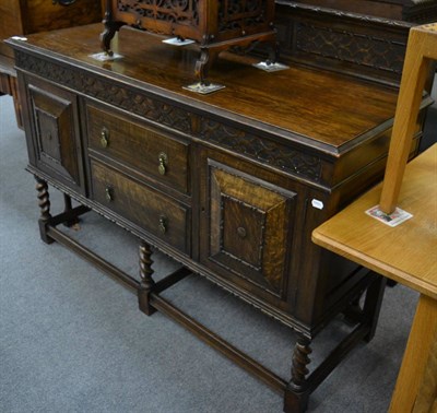 Lot 1138 - An early 20th century oak sideboard