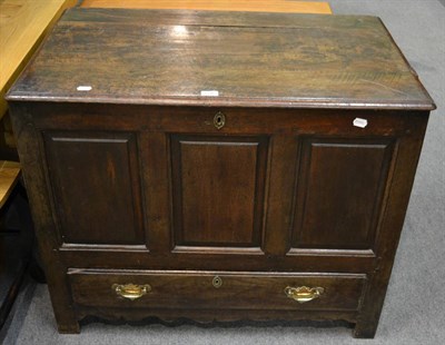 Lot 1146 - A Georgian panelled oak coffer with single drawer