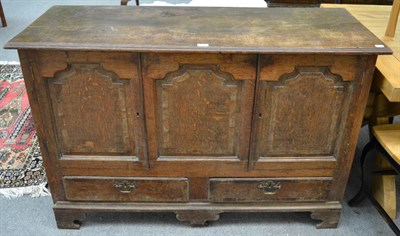 Lot 1147 - An 18th century oak mule chest (converted)