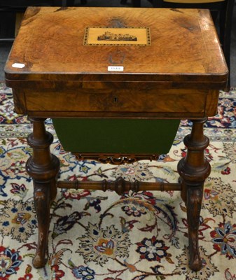 Lot 1149 - A Victorian burr walnut veneered inlaid work/games table