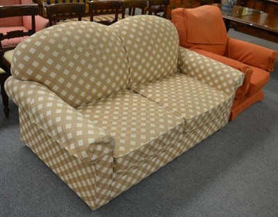 Lot 1161 - A modern two-seater sofa bed and a modern armchair (2)