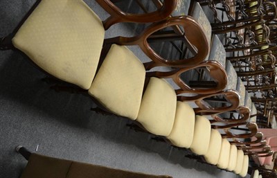 Lot 1165 - A set of ten balloon back chairs with upholstered seats