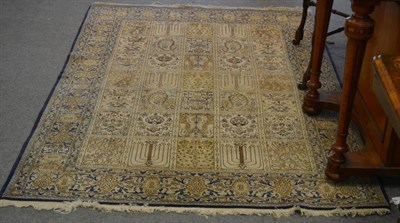 Lot 1175 - Ghom rug, central Persia, the compartmentalised field of flowers and boteh enclosed by floral...