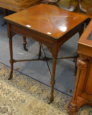 Lot 1178 - A late Victorian walnut envelope card table, stamped Gregory & Co