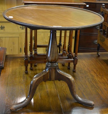 Lot 1180 - A small mahogany occasional table and a mahogany tripod table