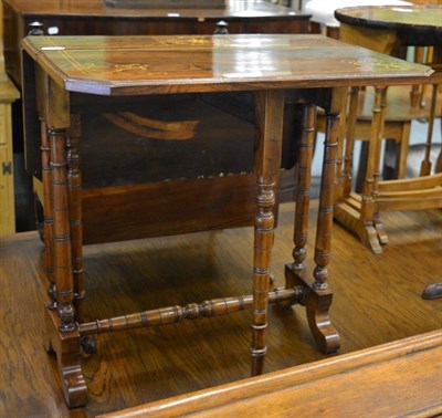 Lot 1181 - A Victorian rosewood and inlaid Sutherland table