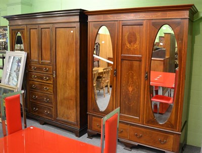 Lot 1203 - An Edwardian mahogany triple wardrobe and a double wardrobe (2)