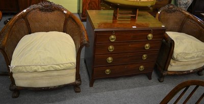 Lot 1208 - A pair of mahogany framed double caned bergere chairs