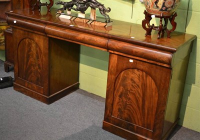 Lot 1214 - A Victorian mahogany twin pedestal sideboard