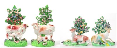 Lot 75 - A Pair of Derby Porcelain Cow Groups, circa 1780, each modelled as a cow and calf standing...