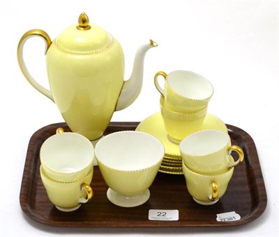 Lot 22 - A Wedgwood ";April"; pattern coffee set with lemon yellow ground, pattern No. W4144