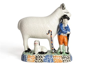 Lot 76 - A Yorkshire Prattware Sheep Group, circa 1800, modelled as a shepherd standing next to a ewe, a...