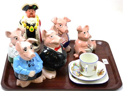 Lot 35 - A collection of five Wade pottery pigs, Beswick Worthington's ales promotional jug and a Royal...