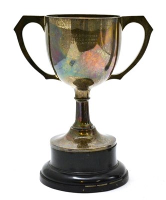 Lot 53 - A silver trophy cup on a wooden socle