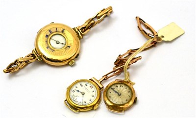 Lot 64 - Two 18ct gold ladies wristwatches together with another yellow metal lady's watch (3)