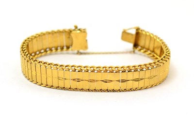 Lot 65 - A yellow metal bracelet