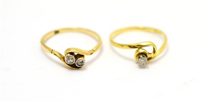 Lot 77 - Two 18ct gold diamond rings, each with crossover settings