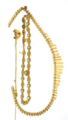 Lot 102 - A 9ct gold and topaz necklace together with a garnet mounted pendant on a 9ct gold fine link...