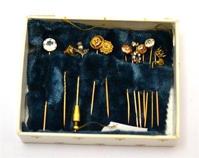 Lot 107 - A group of tie pins including three Victorian diamond set examples stamped 15ct, a 9ct pin and...