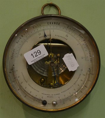 Lot 129 - A brass cased Holosteric Barometer with centigrade and Fahrenheit's thermometer by Husbands &...