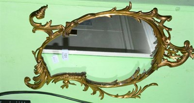 Lot 131 - A Rococo style gilt framed mirror