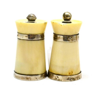 Lot 137 - A pair of silver mounted ivory pepperettes, Birmingham 1920