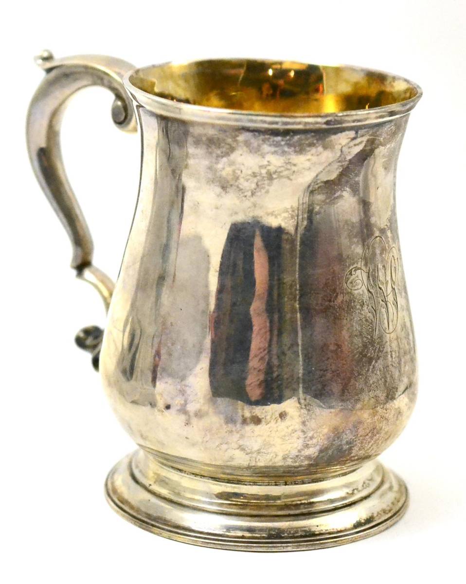 Lot 141 - A George III silver baluster mug, London 1762, maker's mark B.B.