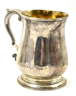 Lot 141 - A George III silver baluster mug, London 1762, maker's mark B.B.